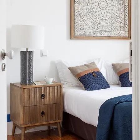Plum Guide - The Ticking Clocks Apartment Lisbon
